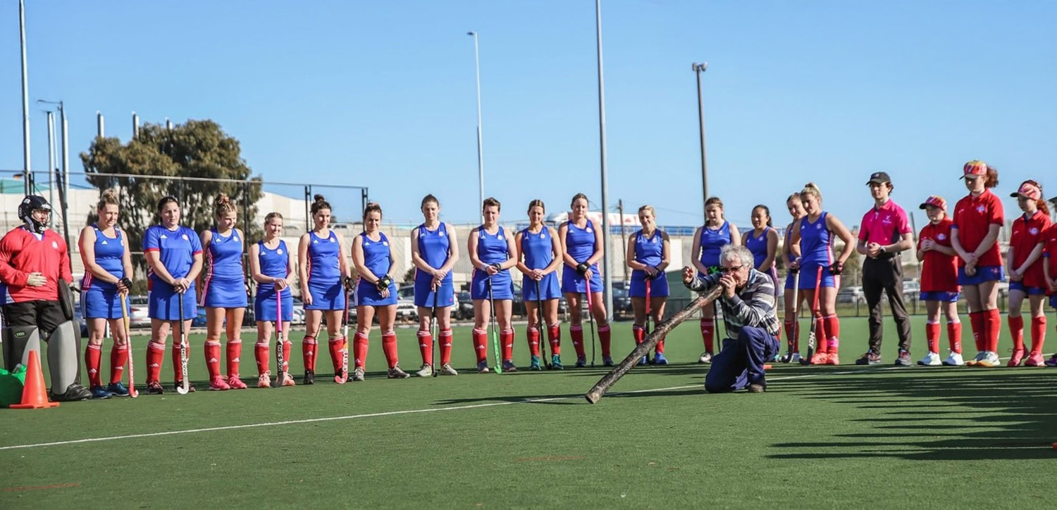 Players and coaches from the Footscray Hockey Club watching 