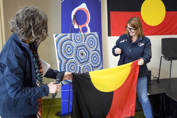 Kessia Thomson and Louise unveiling the GWW RAP artwork. 