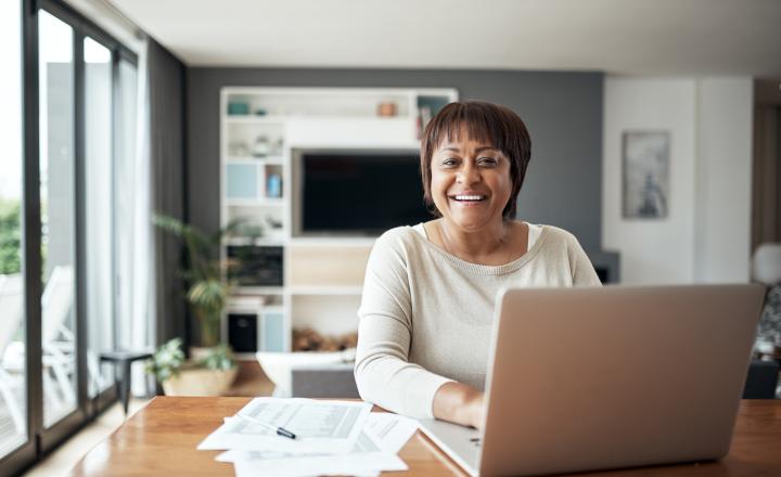 Customer at a computer with a bill