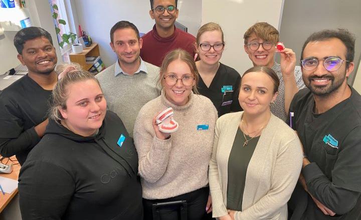 A photograph of members of the Australian Dental Foundation 
