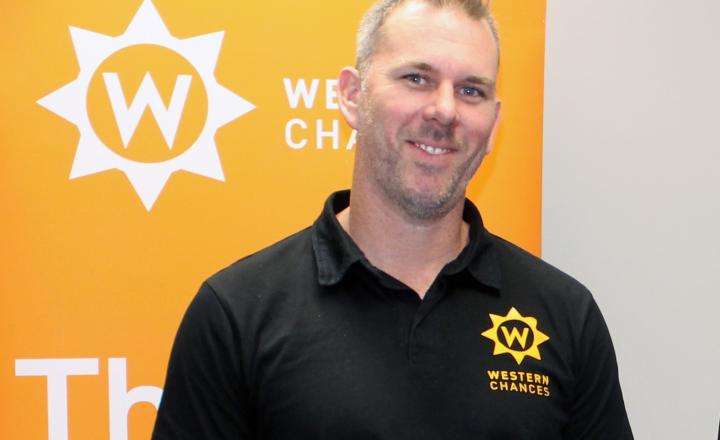A smiling man. 